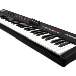 Alesis QX61 Advanced MIDI controller keyboard angled view