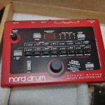 Nord Drum unboxing - emerging from box